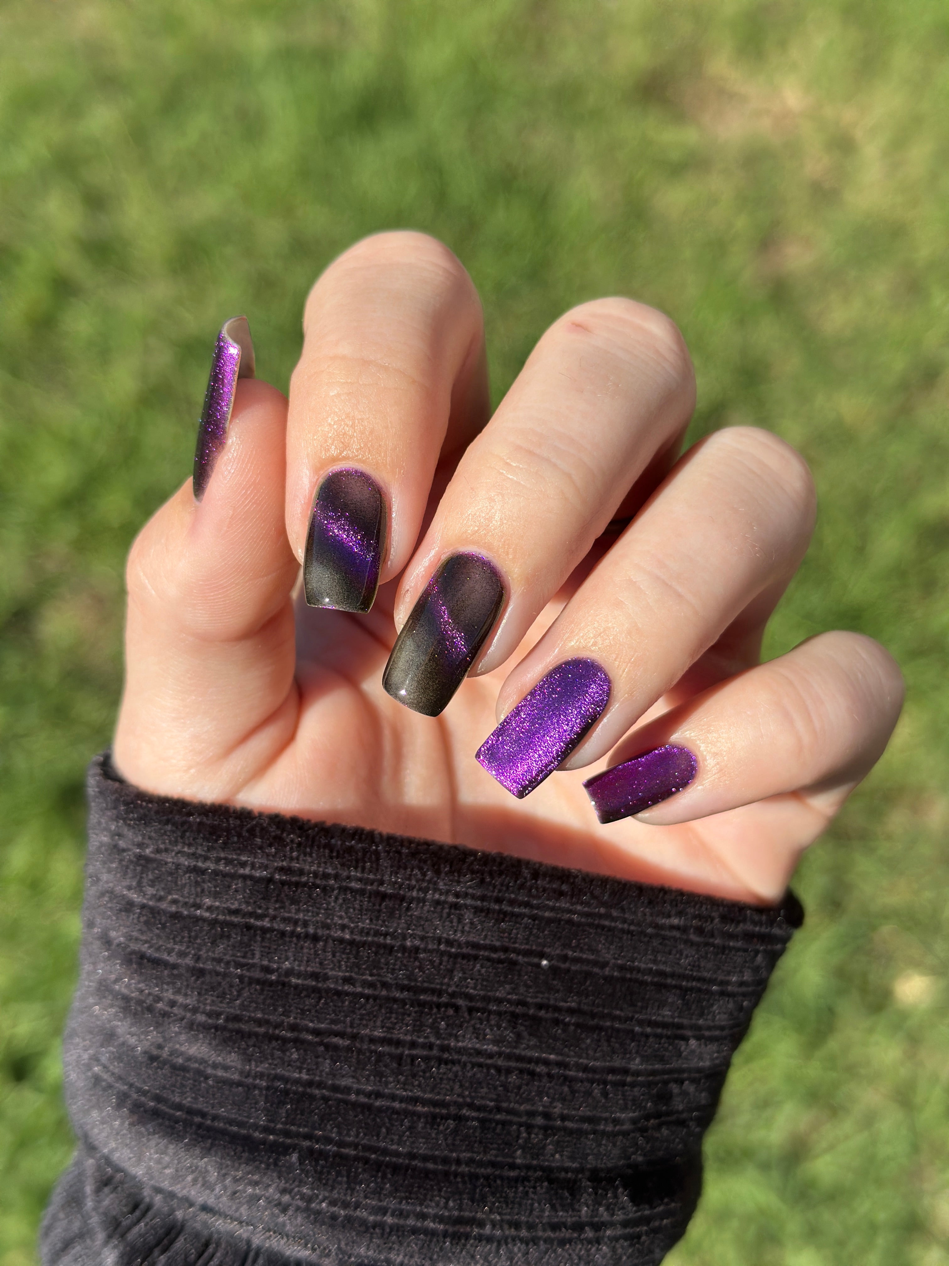 Habibi by Glitch Lacquer, dark purple-pink-gold magnetic swatch on light skin, squoval nails