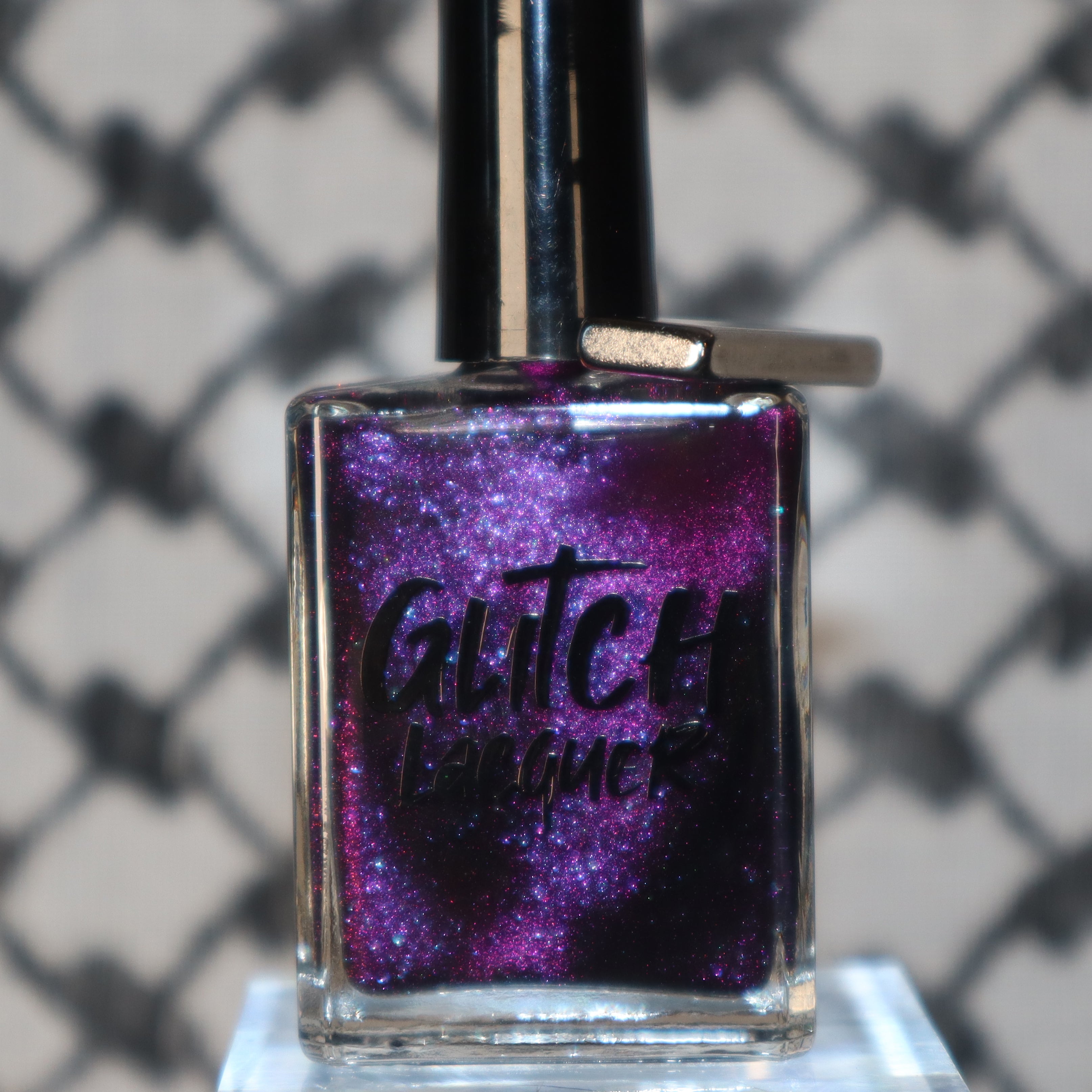 Habibi by Glitch Lacquer, dark purple-pink-gold magnetic bottle standalone product shot