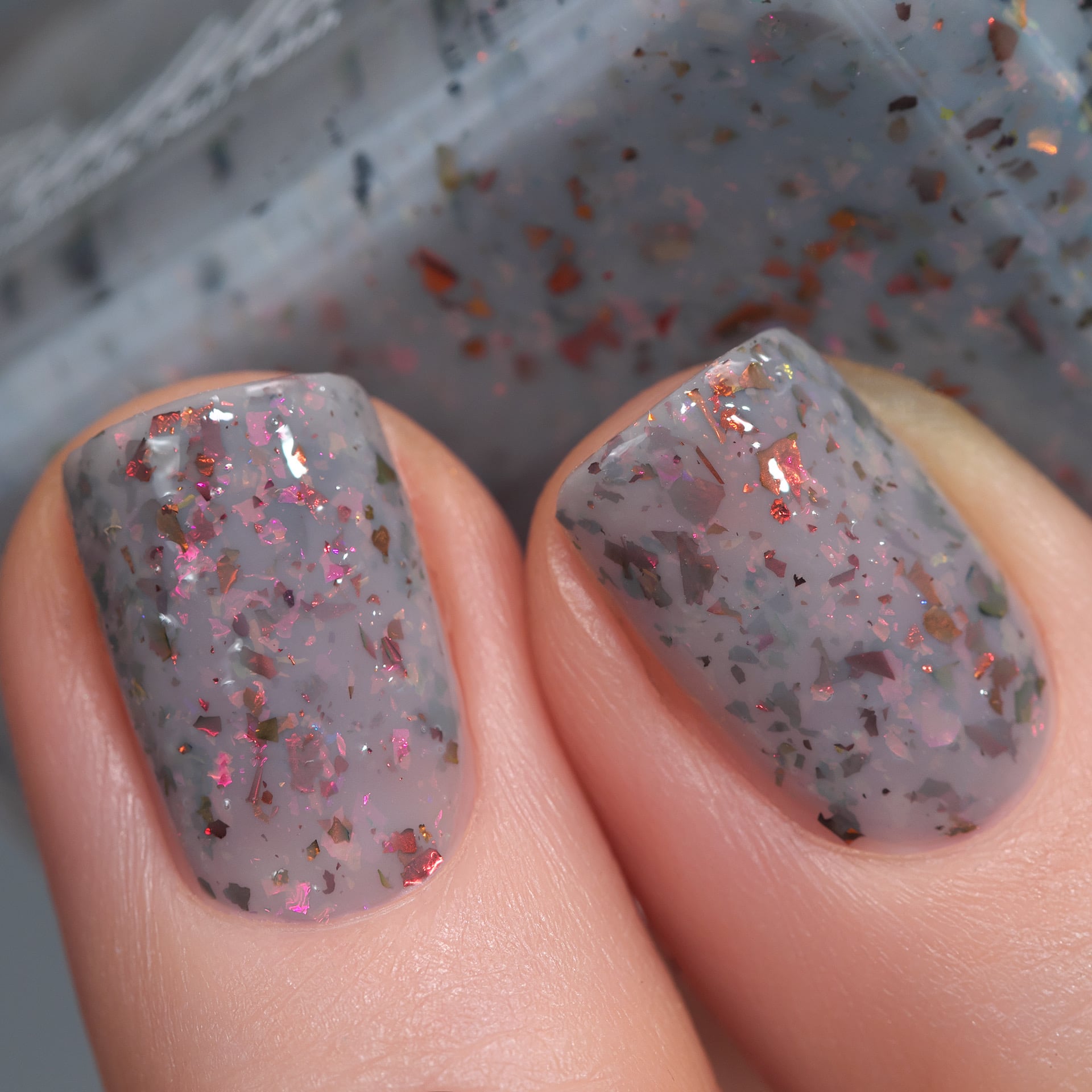 Cadillacquer Daydreaming grey red chameleon iridescent crelly nail polish, swatched on four nails, light skin, studio lighting, by @Lakodzen