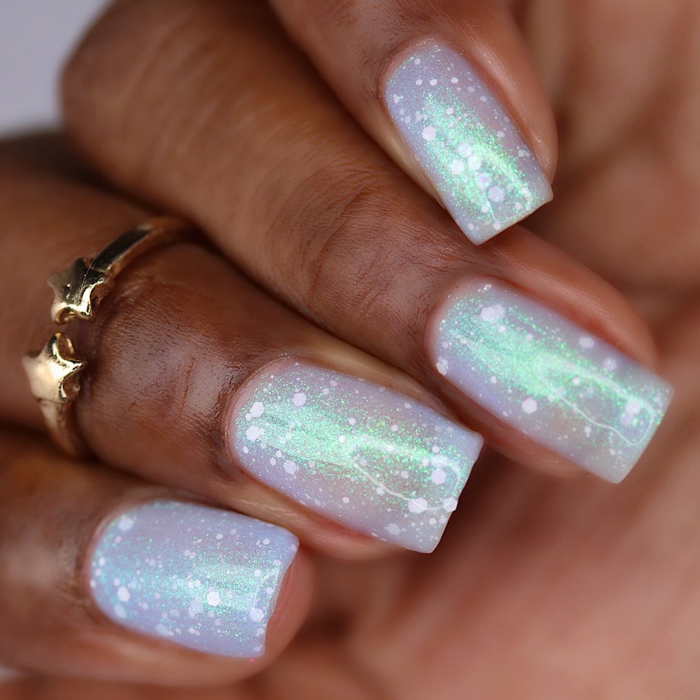Spotted Glass Frog by Cadillacquer swatched, pastel blue jelly with white glitter
