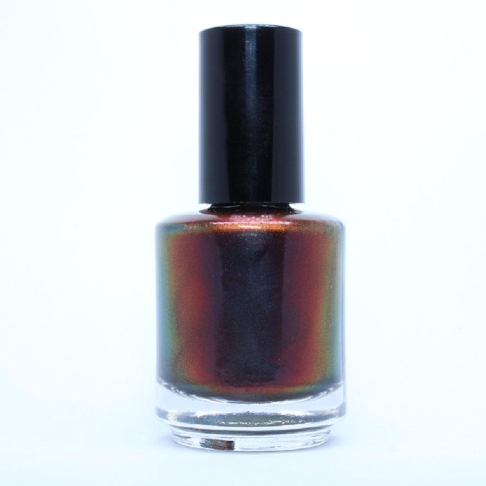 Change of Heart by Dam Nail Polish, near-black multichrome shifting red-to-orange at center with olive-green edge shift, bottle standalone product shot
