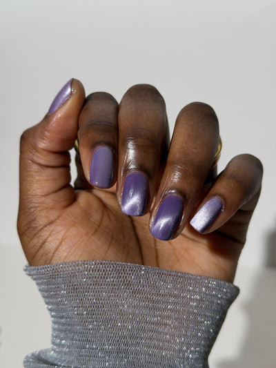 Liberation by Glitch Lacquer, lavender silver magnetic swatch on deep skin tone, round nails