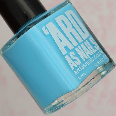 Sky Blue by 'Ard As Nails, sky blue creme with white label branding on soft pink background, bottle standalone product shot
