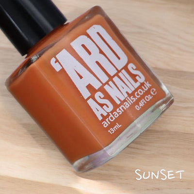 Sunset by 'Ard As Nails, dusty burnt orange creme with terracotta warmth, bottle standalone product shot