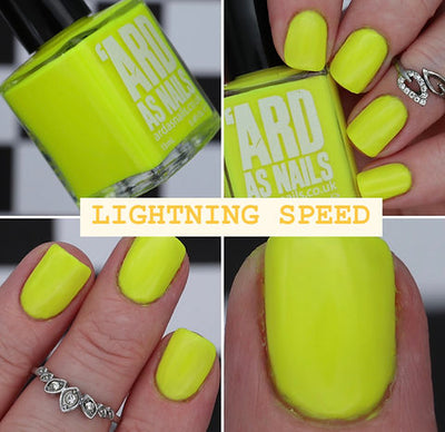 Lightning Speed by 'Ard As Nails, neon yellow-green creme, opaque and vivid under bright daylight, on a light skin tone hand