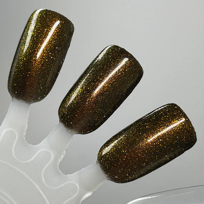 Champagne Sparkles by Dam Nail Polish, dark olive-brown jelly base with multidimensional bronze-gold shimmer and fine gold reflective glitter particles, swatch stick