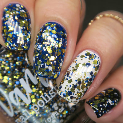 Kintsugi by Dam Nail Polish, black-blue glitter topper layered over royal blue, white, and black bases showing gold, blue, and white hex glitters in bright daylight, layering demo