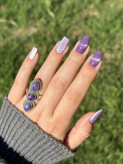 Liberation by Glitch Lacquer, lavender silver magnetic swatch on light-medium skin tone, coffin nails