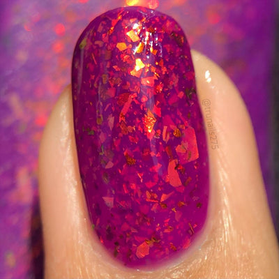 Evening in Provence by Chamaeleon Nails, macro close-up of dense orange-red and copper-gold UCC flakie shards over a magenta base under direct flash