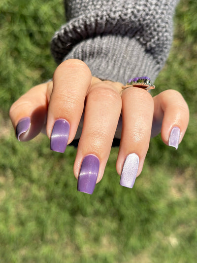 Liberation by Glitch Lacquer, lavender silver magnetic swatch on light-medium skin tone, square nails