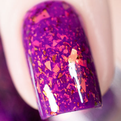 Evening in Provence by Chamaeleon Nails, macro close-up of large copper-to-green shifting UCC flakes and orange-gold flakies over a deep magenta-purple jelly base