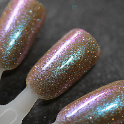 Halloween Quad Full Set by Dam Nail Polish, Field of Screams warm tawny brown base shifting brown to pink to teal with dense holographic microglitter, swatch stick