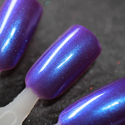 Halloween Quad Full Set by Dam Nail Polish, A Grave Mistake in violet-purple with vivid electric blue color-shifting multichrome shimmer, swatch stick