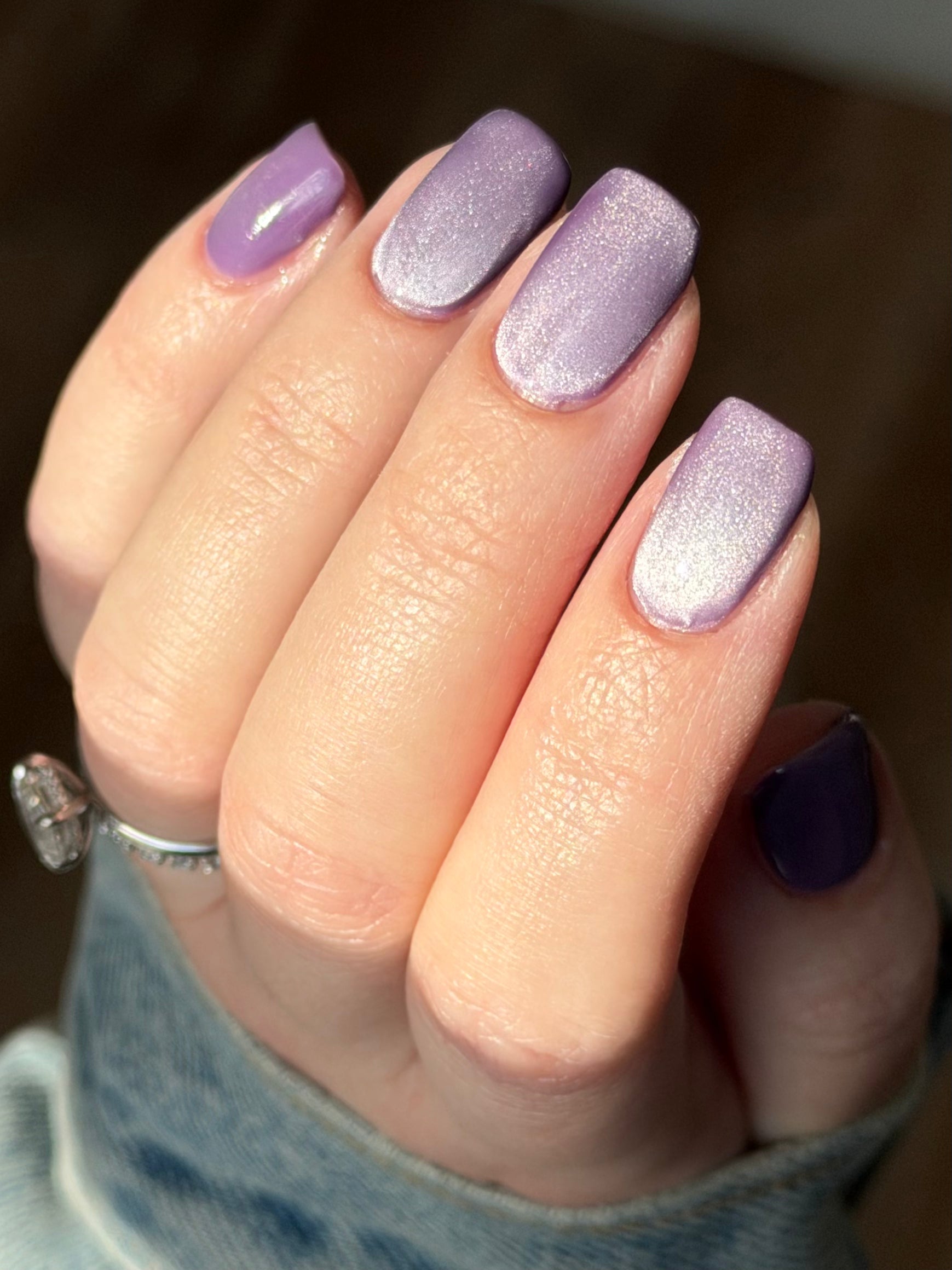 Liberation by Glitch Lacquer, lavender silver magnetic swatch on light-medium skin, daylight