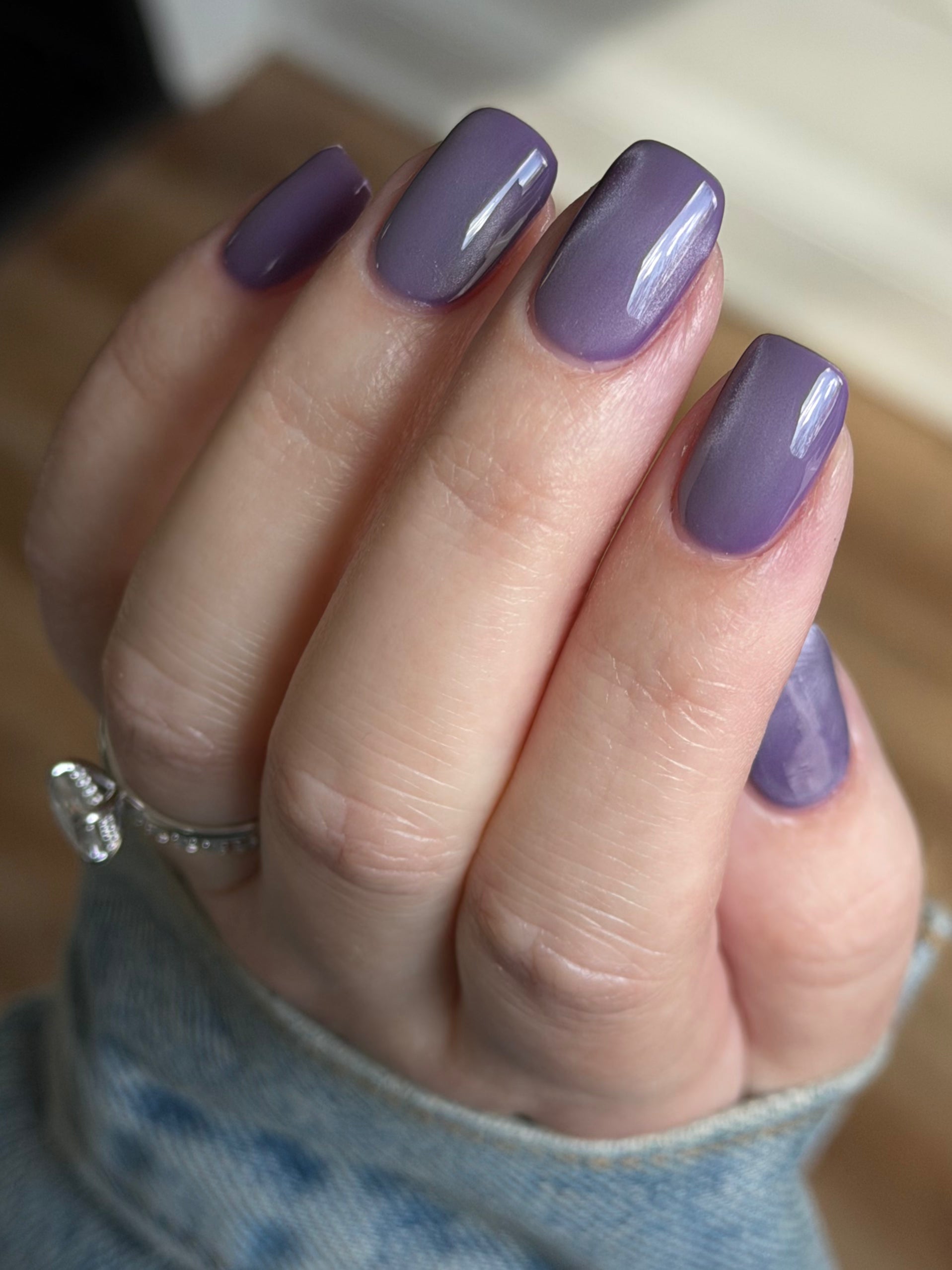 Liberation by Glitch Lacquer, lavender silver magnetic swatch on light skin tone