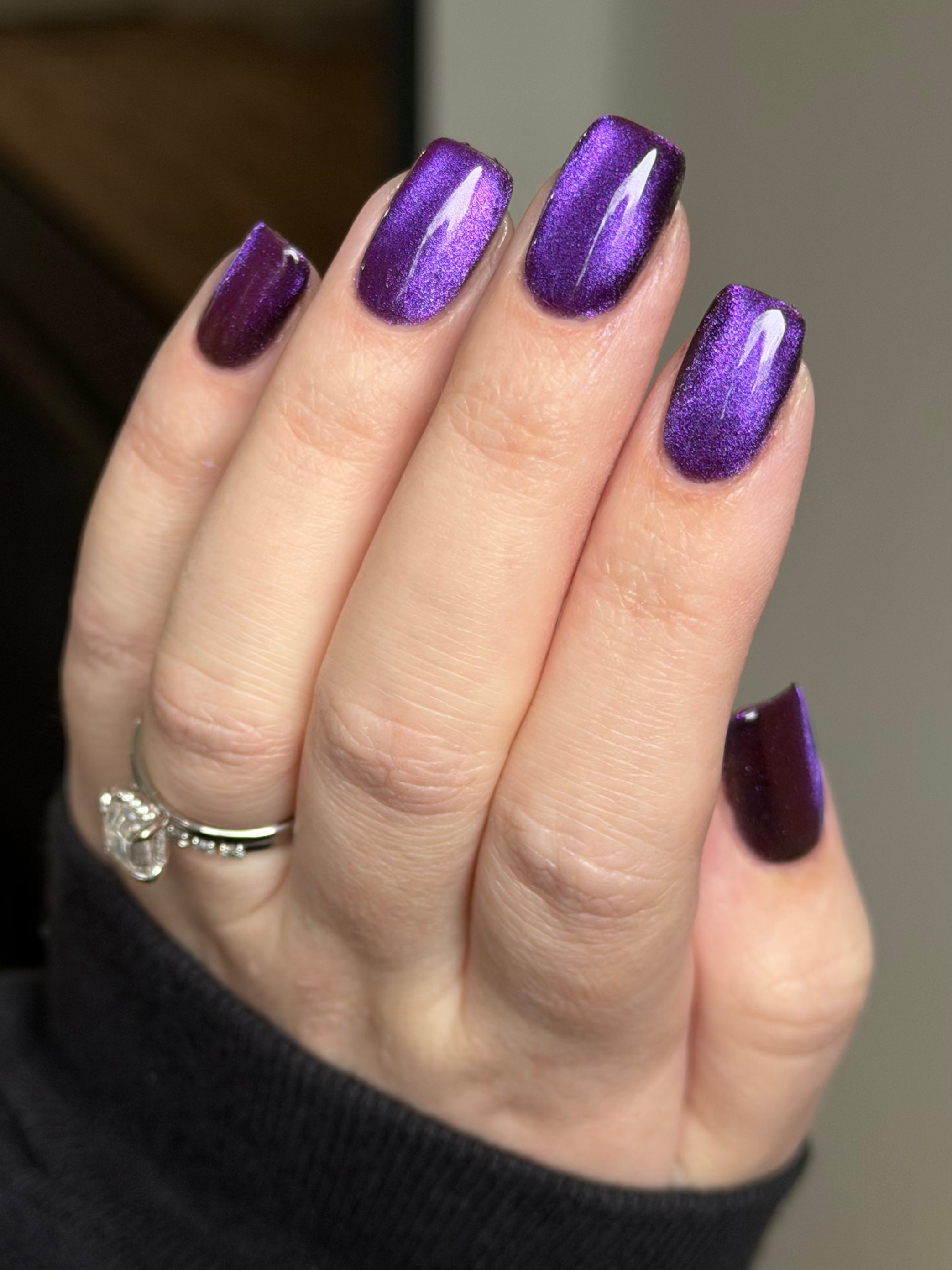 Habibi by Glitch Lacquer, dark magnetic cat-eye swatch on light skin, squoval nails