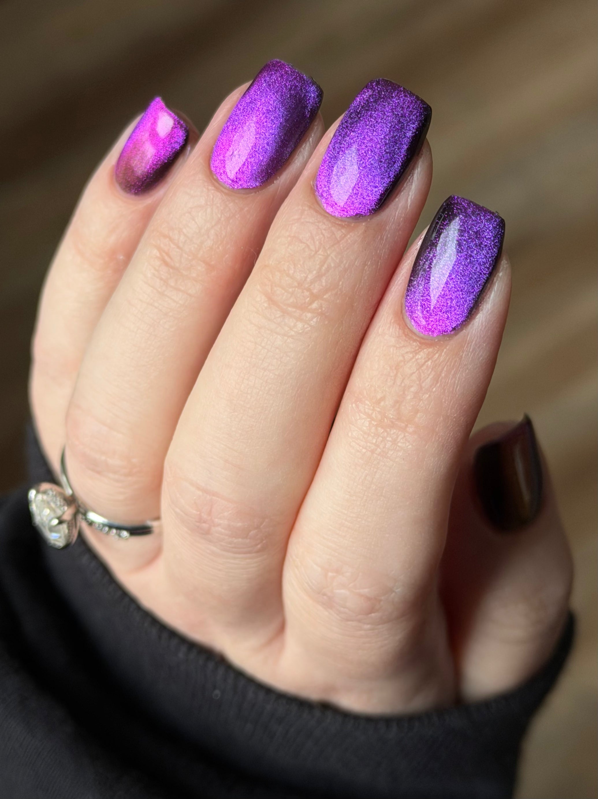 Habibi by Glitch Lacquer, dark magnetic swatch on light skin, square nails, warm indoor light