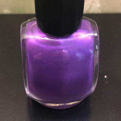 Baroness by Prairie Crocus Polish, medium-deep violet purple with pearlescent shimmer particles, bottle standalone product shot