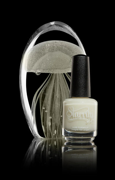 Ghost Jelly by Starrily, soft warm white sheer jelly showing milky translucency, bottle standalone product shot