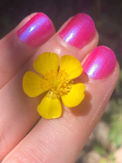 80s Hair by Prairie Crocus Polish, hot pink with strong blue shimmer shift in bright daylight, on a light skin tone hand