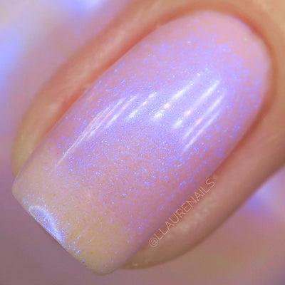 A Whimsical Dream by Dam Nail Polish, macro close-up of dense blurple iridescent flake scatter over a soft pink jelly base with pale lavender highlights