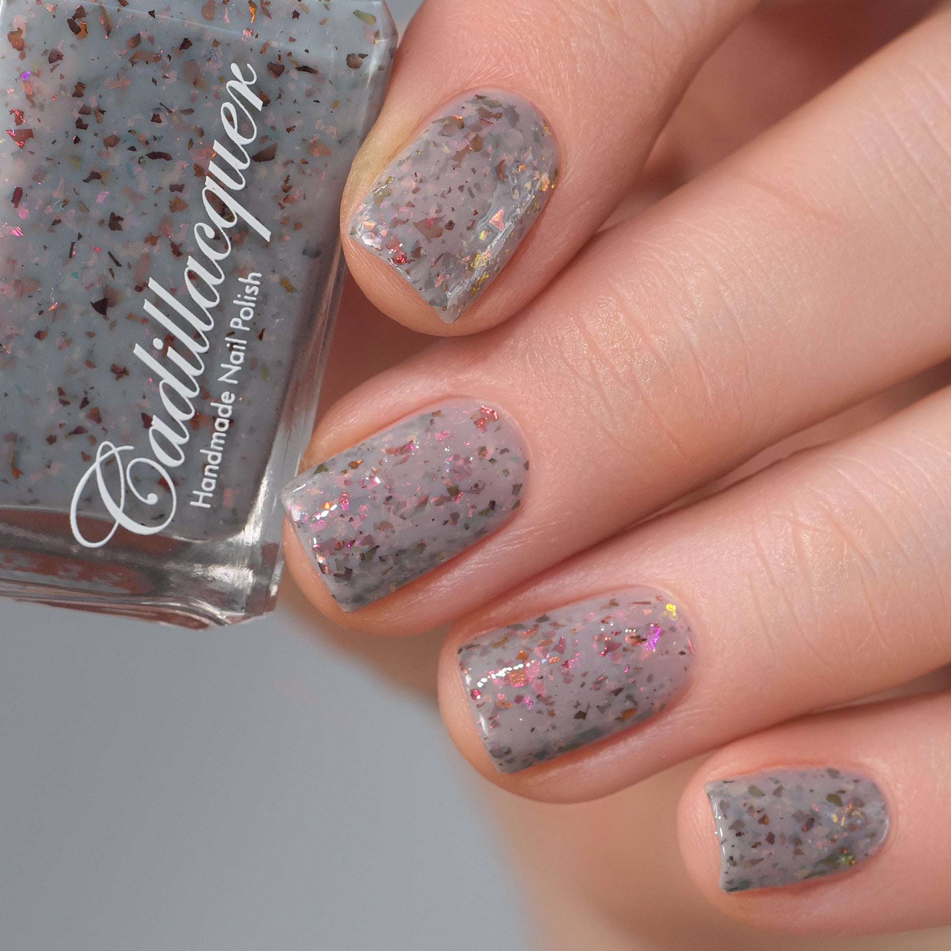Cadillacquer Daydreaming grey red chameleon iridescent crelly nail polish, swatched on five nails, light skin, studio lighting, by @Lakodzen
