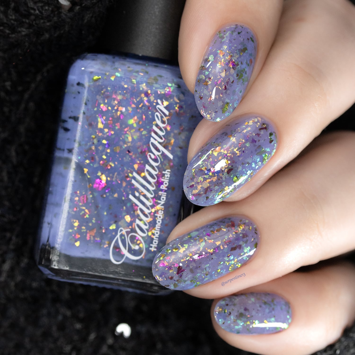 Cadillacquer Don't Worry purple pink chameleon iridescent crelly nail polish, swatched on four nails, light skin, studio lighting