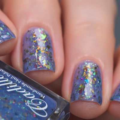 Cadillacquer Don't Worry purple pink chameleon iridescent crelly nail polish, swatched on four nails, light skin, studio lighting
