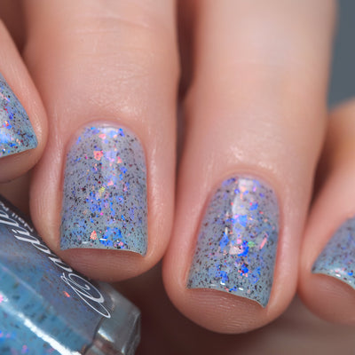 Cadillacquer Just Breathe pastel blue iridescent crelly nail polish, swatched on four nails, light skin, studio lighting, by @Lakodzen