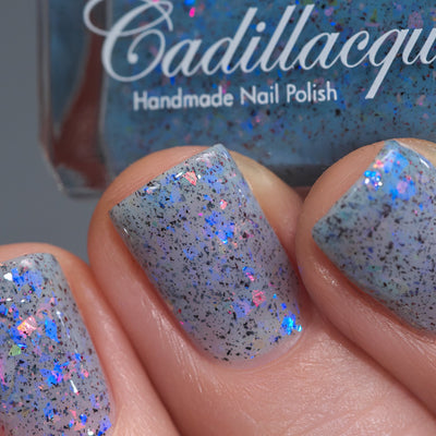 Cadillacquer Just Breathe pastel blue iridescent crelly nail polish, swatched on three nails, light skin, studio lighting, by @Lakodzen