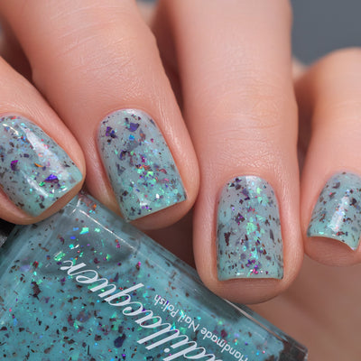 Cadillacquer Pastel Thoughts pastel teal purple chameleon iridescent crelly nail polish, swatched on four nails, light skin, studio lighting