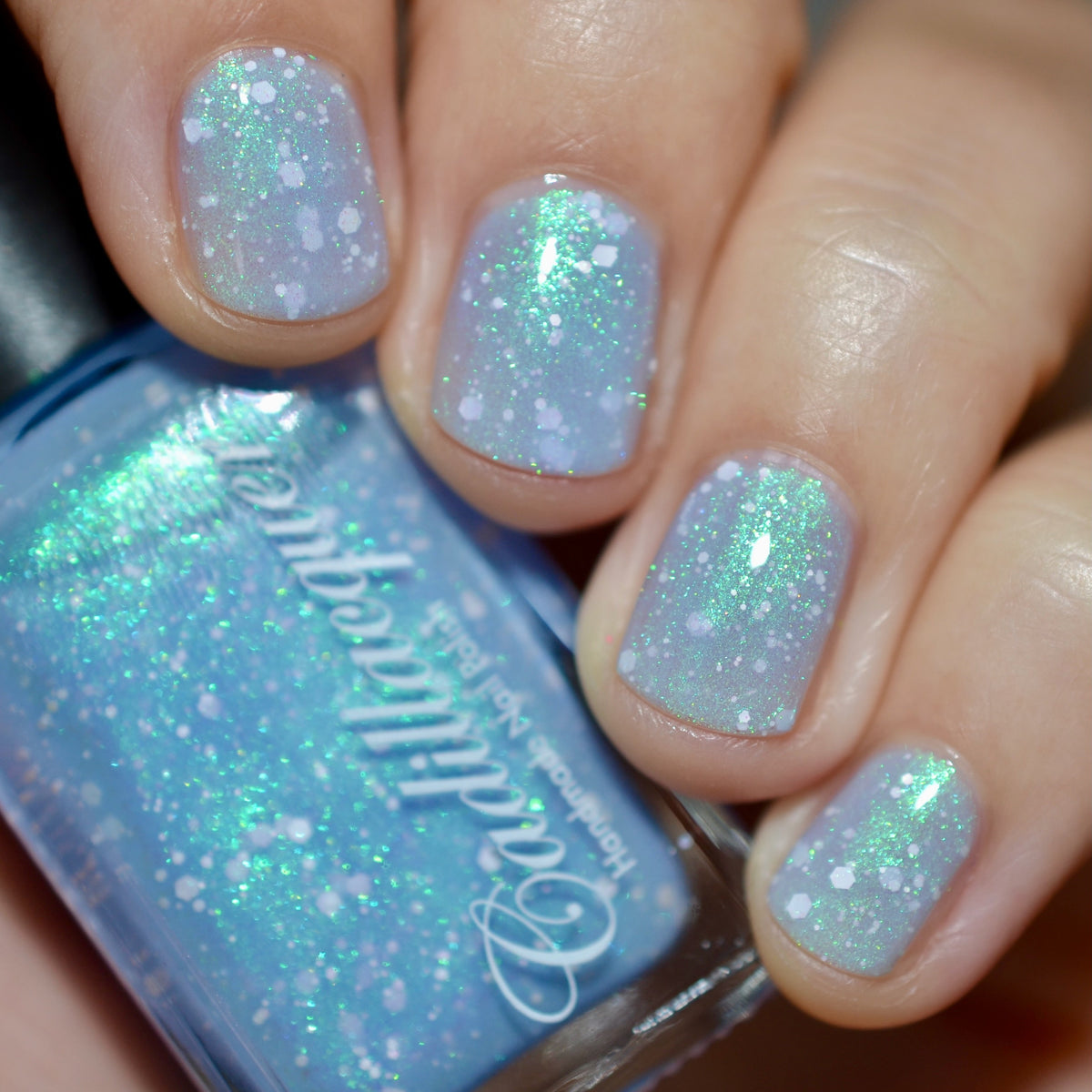 Cadillacquer Spotted Glass Frog pastel blue jelly nail polish swatch with white glitter
