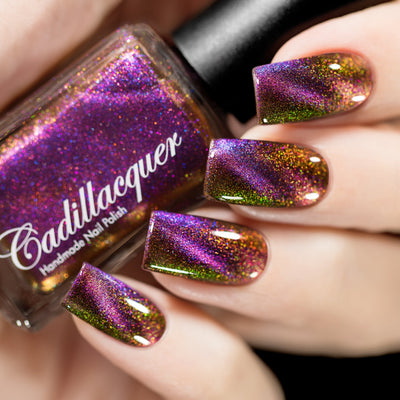 Magnetic shimmer Cadillacquer nail polish in The Ones Who Live, a purple magnetic over a red to orange to green shifting shimmer, swatched by @rafinails