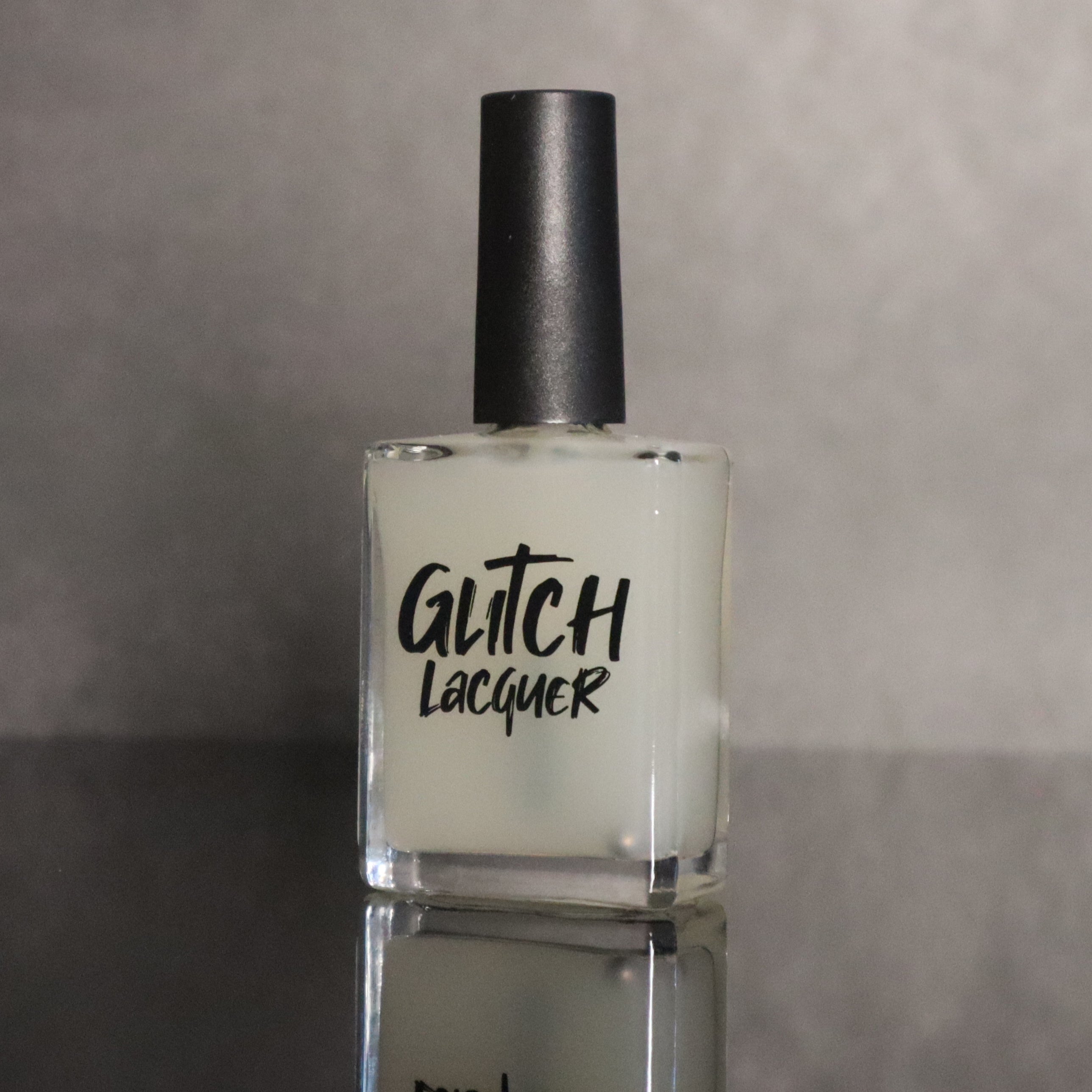 Lock & Key by Glitch Lacquer, clear magnetic sealer coat that locks in magnetic nail designs, bottle