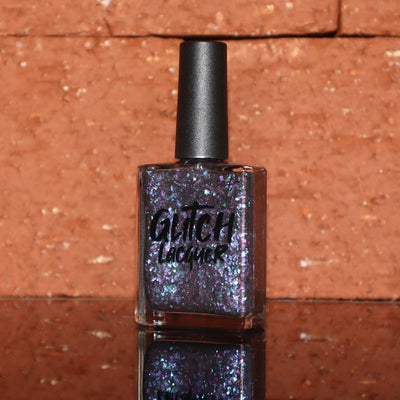 AVEN by Glitch Lacquer, soft black base with iridescent purple flakes and black holo micro-glitter, bottle