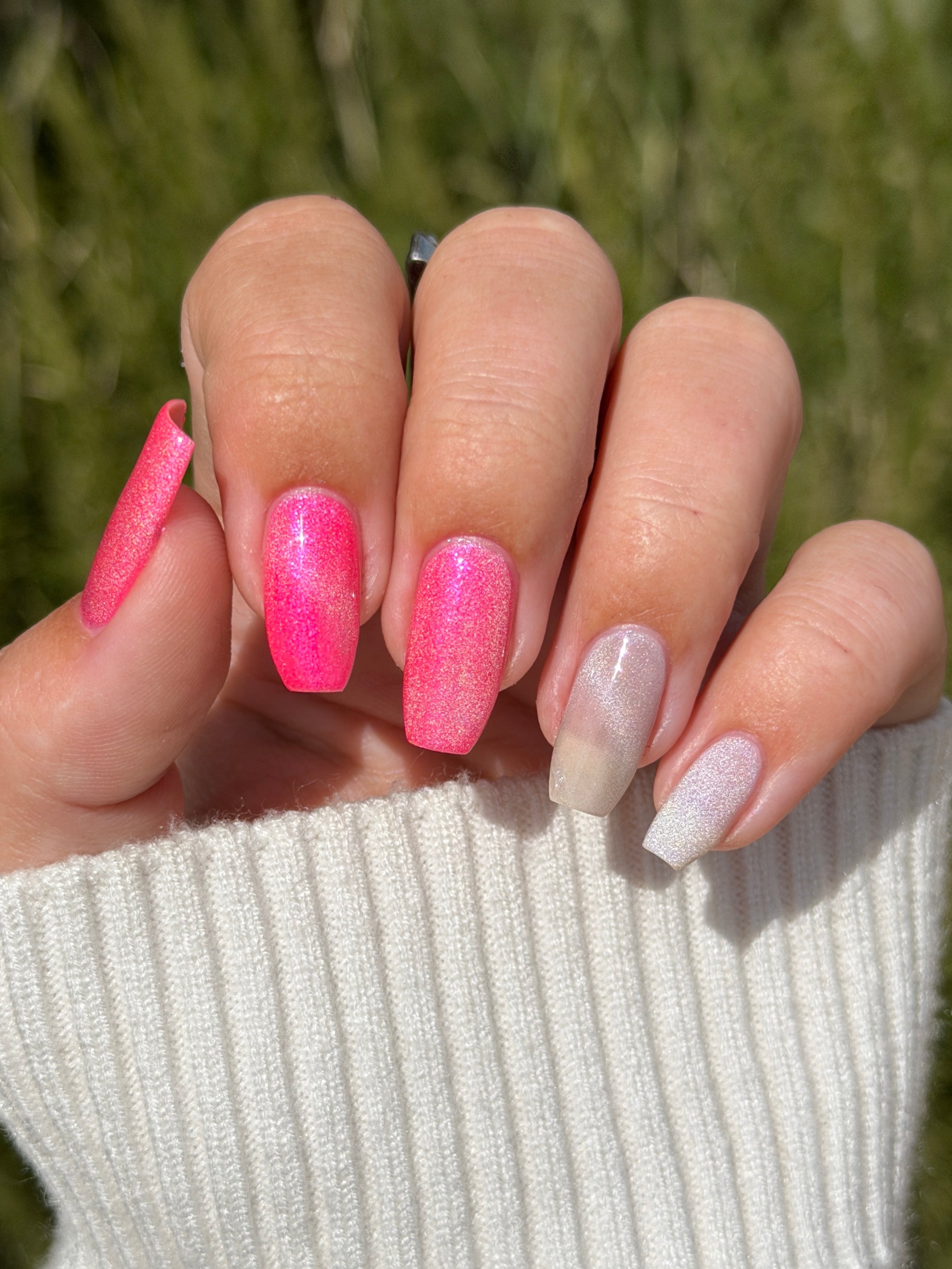 Ally by Glitch Lacquer, silver holographic magnetic topper over pink and greige bases, on light-medium skin tone nails