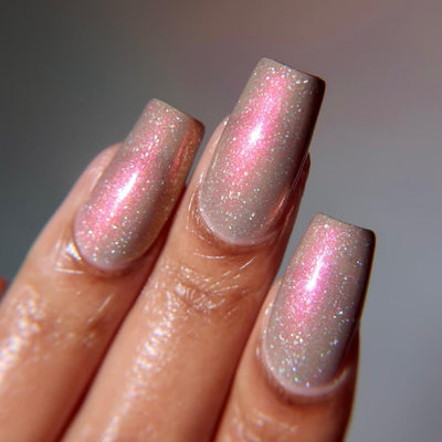 Speed Force by Danglefoot Nail Polish, black-grey holographic duochrome shimmer flakie on a light-medium skin tone hand