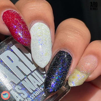 Neptune by 'Ard As Nails, multichrome holo flakie topper shifting blue-purple on dark bases and gold-green on white, layering demo over red, white, black, and bare nail