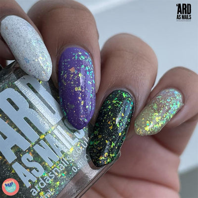 Saturn by 'Ard As Nails, multichrome holo flakie topper with gold-to-pink-purple over white, teal-to-gold over purple, green-to-gold over black, layering demo