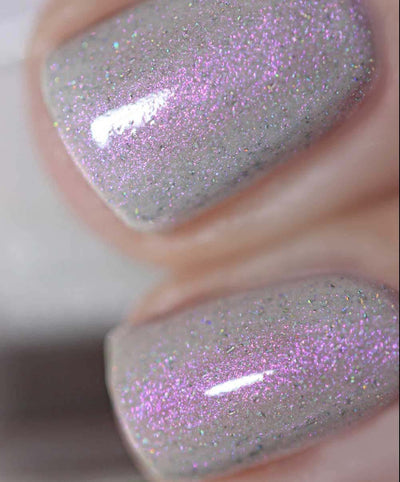 Bean Toes by Starrily, macro close-up of grey-lavender creme with dense pink-purple shimmer shift and rainbow holographic micro-fleck scatter