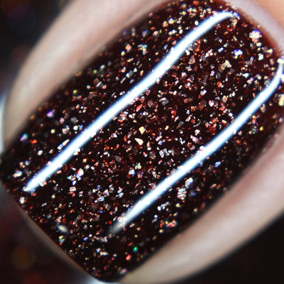 Into The Woods by Starrily, macro close-up of copper, reddish-brown, and bronze holographic flakes over a near-black brown base