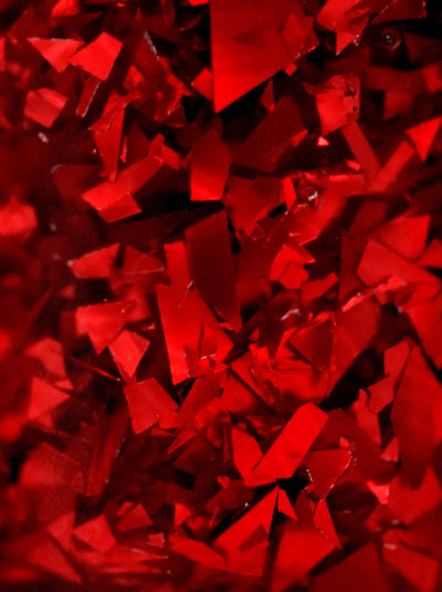 Rose Petals by Starrily, macro close-up of large angular foil flakes showing high-contrast scarlet highlights and deep crimson shadows between shards