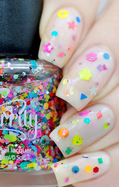 Toy Story by Starrily, multicolor shaped glitter topper over sheer milky cream base with neon pink, yellow, and rainbow confetti glitters including stars, hearts, and hexagons, on a fair skin tone hand