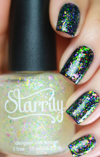 Unicorn by Starrily, iridescent multichrome flakie topper showing vivid green, pink, purple, and blue ultrachrome shard shift over black base, layering demo