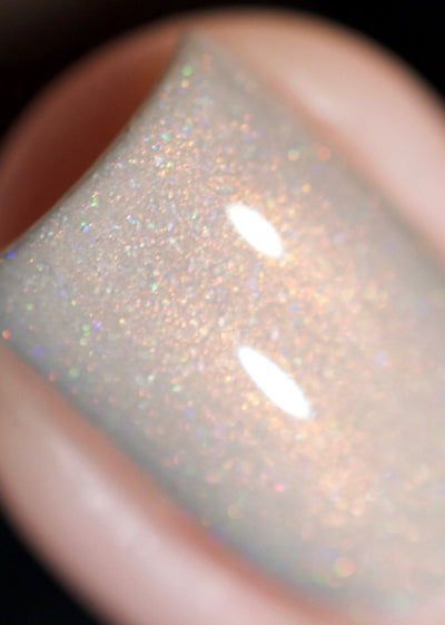Moon Glow by Starrily, macro close-up of warm copper shimmer and multispectral micro holographic flecks against soft grey creme base