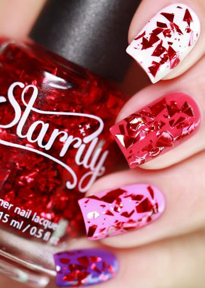 Rose Petals by Starrily, large mirror-like red foil-shard glitter topper shown over white, hot pink, and lilac creme bases, layering demo on a light skin tone hand