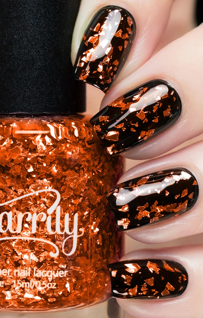 Citrine by Starrily, orange glitter topper with copper-orange foil flakes over black creme base, layering demo