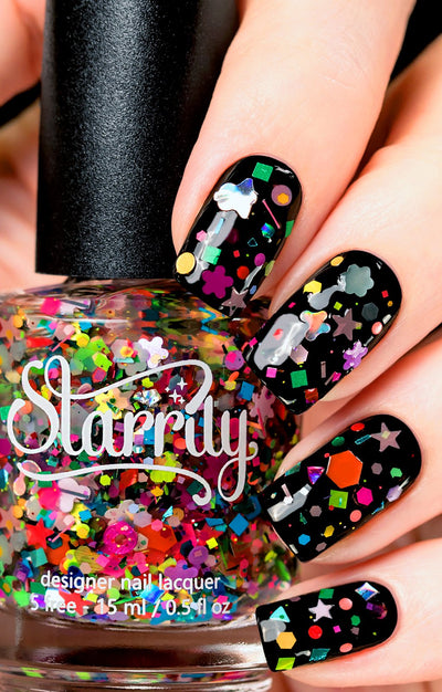 Toy Story by Starrily, multicolor multi-shape glitter topper over black base with holographic silver and hot pink shaped glitters, bottle held in a light skin tone hand