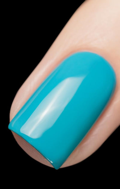 Private Island by Starrily, vivid cyan-turquoise blue holographic glitter creme with bright glossy shine, on a light skin tone hand