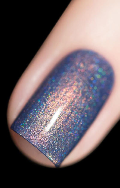 The Cat's Meow by Starrily, macro close-up of dusty periwinkle-purple creme base loaded with bright copper shimmer and scattered blue-teal holographic flecks